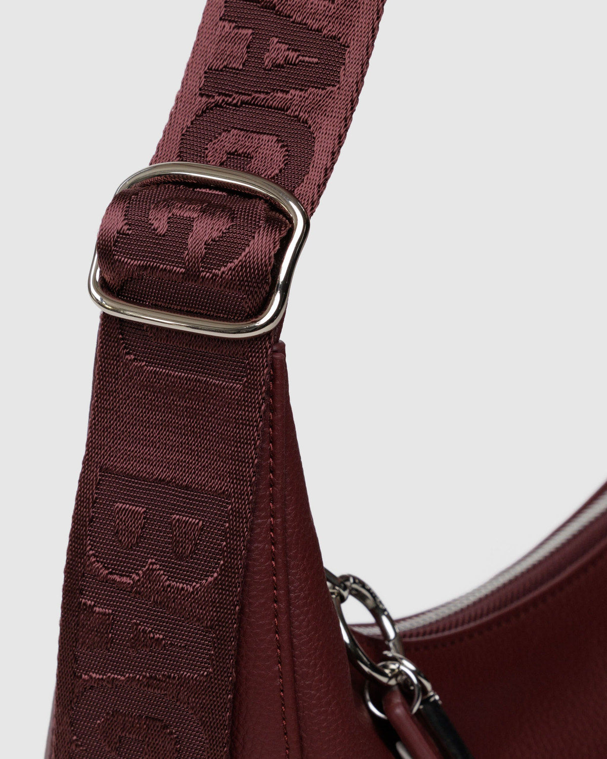 Medium Recycled Leather Crescent Bag Mahogany | Baggu Featured